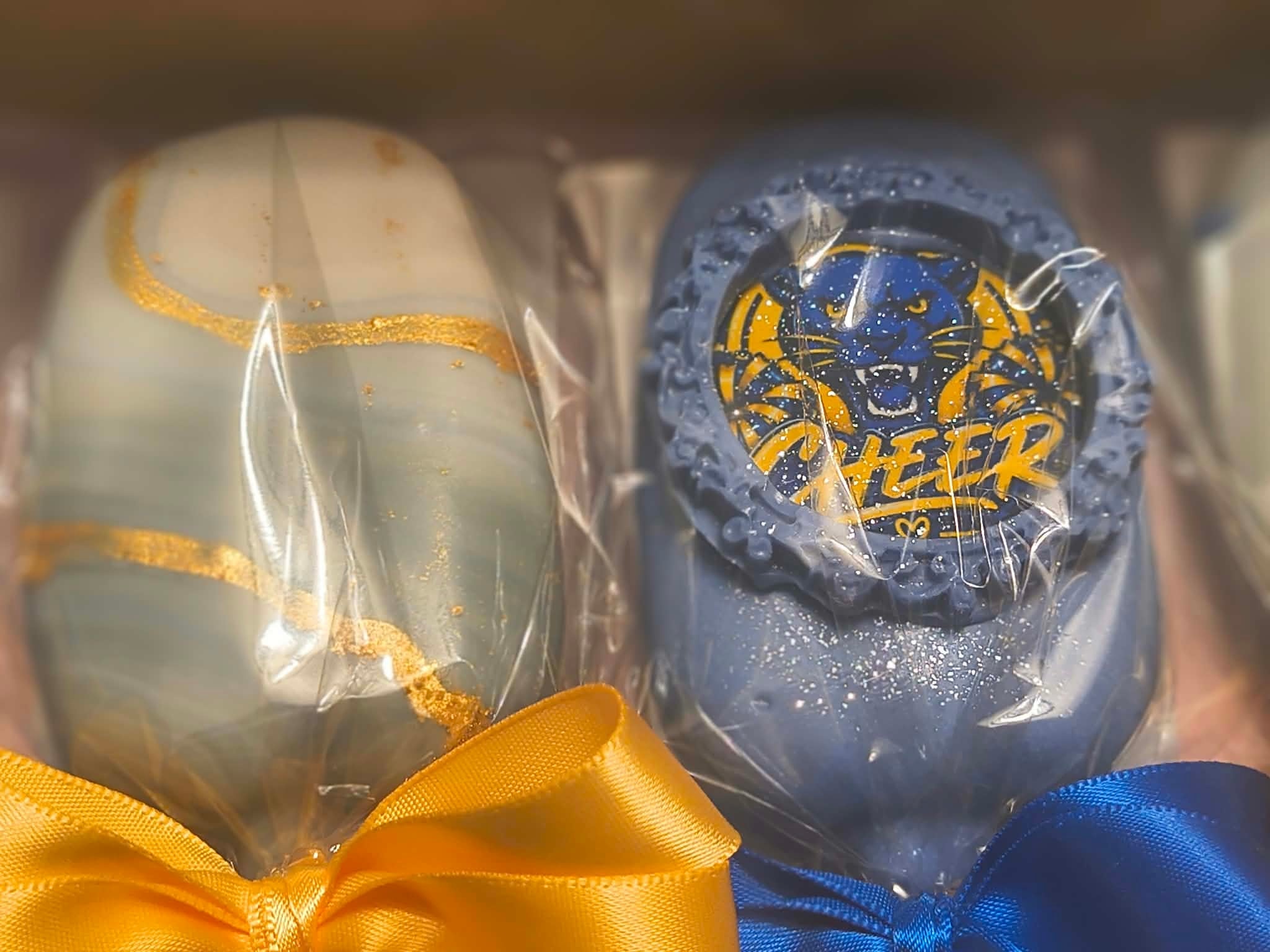 Decorative treats with gold and blue ribbons