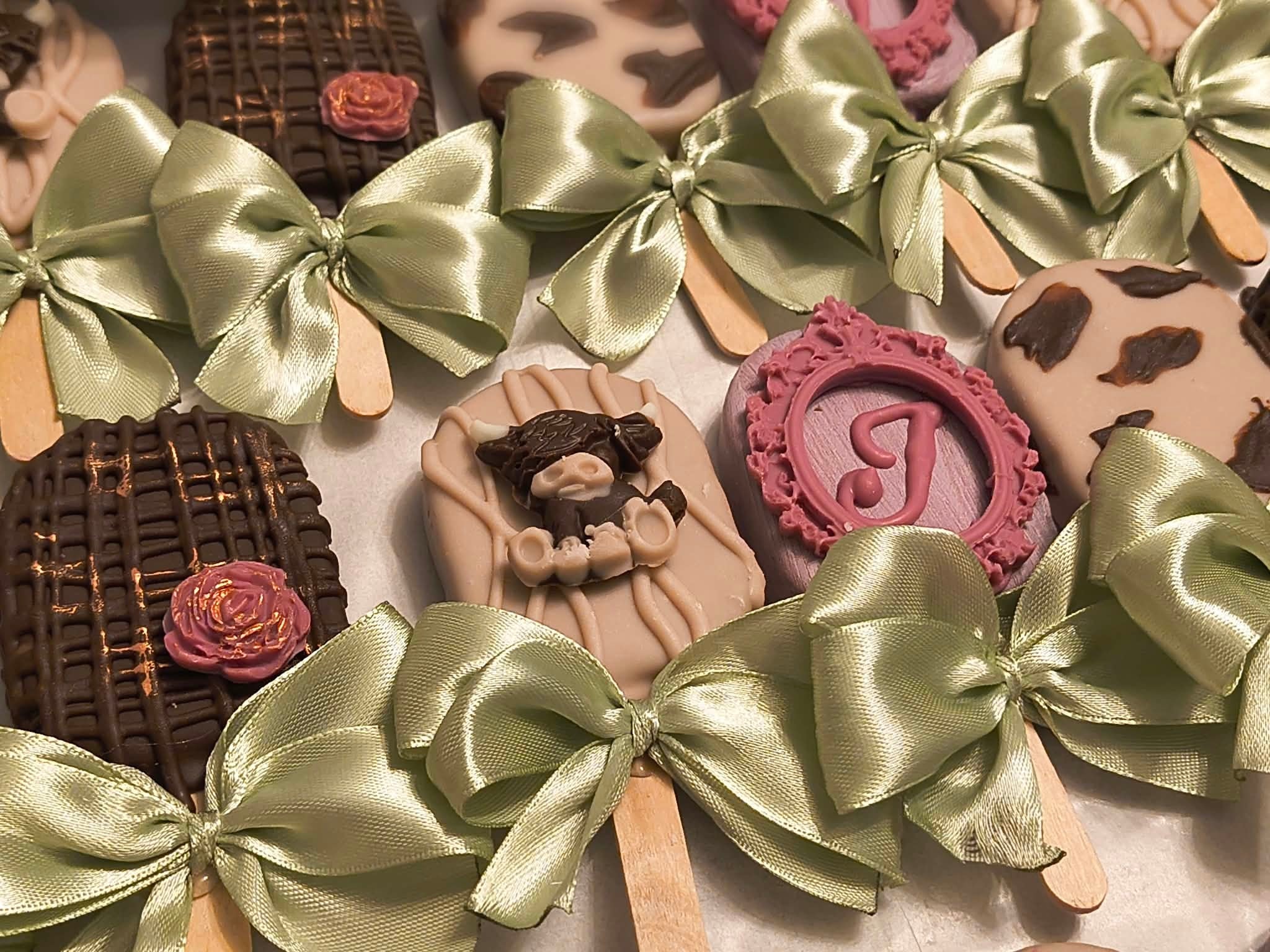Chocolate treats with green bows